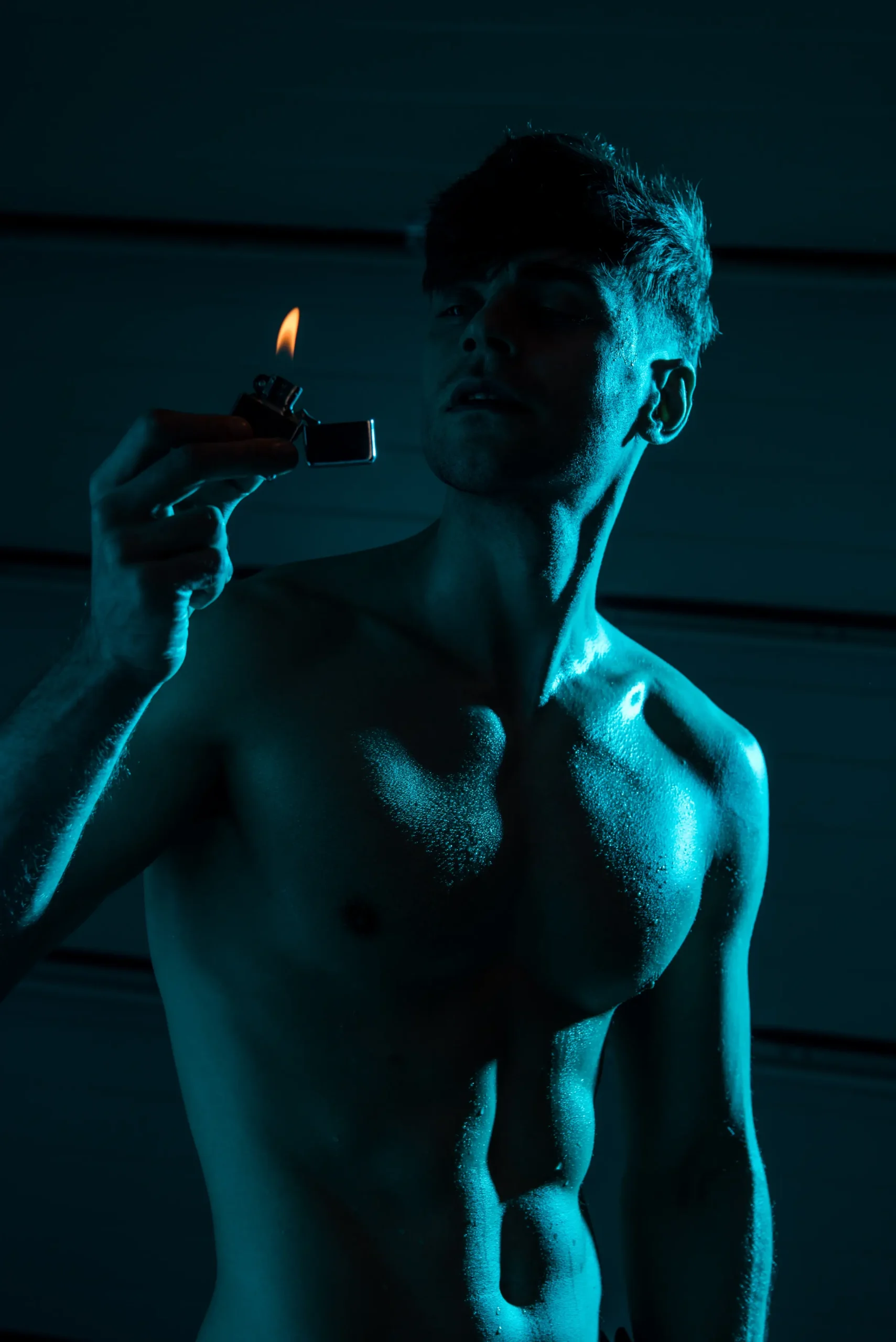 sexy shirtless muscular man holding lighter in dar 2024 11 08 20 57 54 utc scaled
